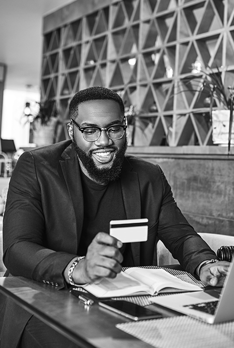 African American gentleman doing business with credit/debit card